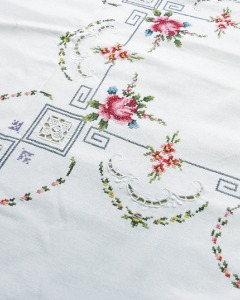 Handmade cross-stitch flower tablecloth